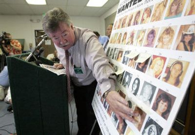 
Los Angeles County sheriff's Capt. Ray Peavy talks Tuesday about efforts to find at least 50 women they have linked to a photographer on death row for murdering two aspiring models.
 (Associated Press / The Spokesman-Review)