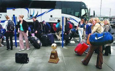 
The Gonzaga women's basketball team arrives on campus with the WCC tournament trophy Monday. After finishing first in league play, the women brought home the hardware and an automatic berth in the NCAA tournament. 
 (CHRISTOPHER ANDERSON / The Spokesman-Review)