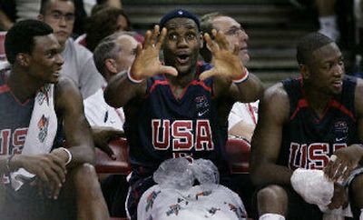 LeBron James jokes with USA Basketball teammates Chris Bosh, left, and Dwyane Wade, right. 
 (Associated Press / The Spokesman-Review)