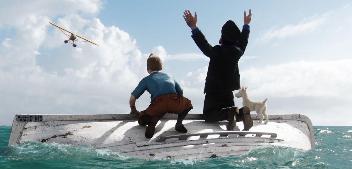 From left, Tintin, voiced by Jamie Bell, Haddock, voiced by Andy Serkis, and Snowy await rescue in a scene from “The Adventures of Tintin,” which opens on Wednesday.