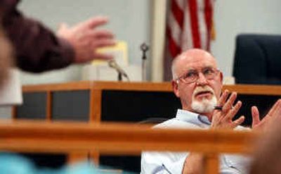 
Bonner County Commissioner Jerry Clemons listens to Mike Nielsen, director of Priest Lake Search and Rescue, at a meeting at the courthouse in Sandpoint on Tuesday. 
 (Kathy Plonka / The Spokesman-Review)