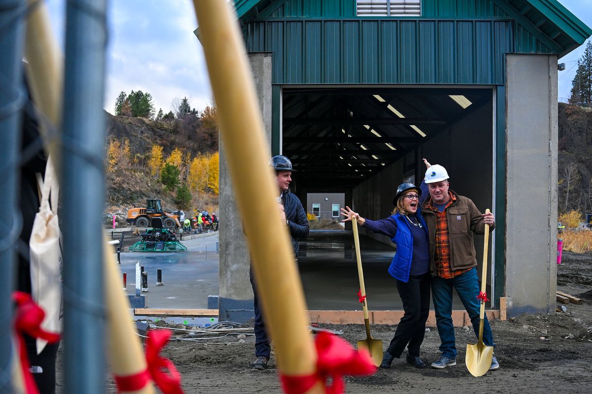 Spokane Conservation District director Vicki Carter poses for a photograph with Chris Olson of Olson Projects architecture firm after the ground breaking ceremony for Scale House Market at the Quarry in Spokane Valley on Tuesday, November 12, 2024. "This wasn