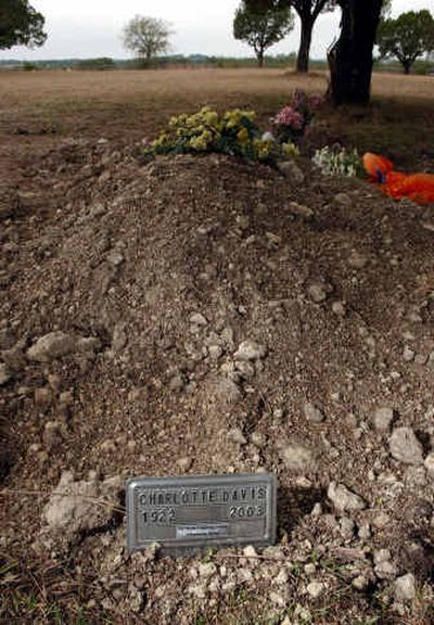 
The corpse of the woman once buried in this grave was stolen and burned in an insurance scam.
 (File/Associated Press / The Spokesman-Review)