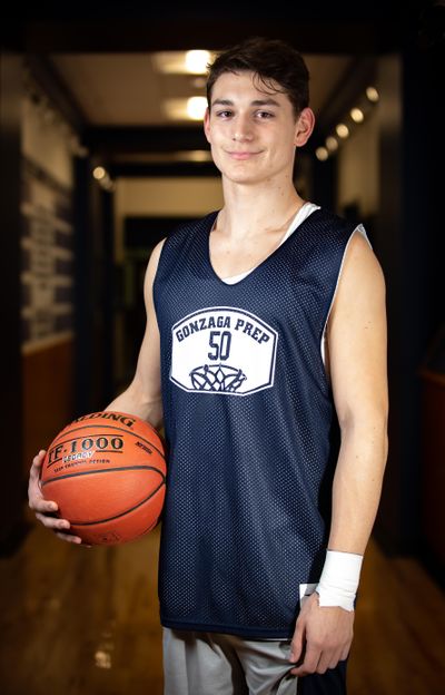 Gonzaga Prep senior Liam Lloyd poses for a photo outside of the gym on Nov. 26, 2019. Lloyd, headed to Grand Canyon University next season, is the son of Gonzaga University assistant basketball coach Tommy Lloyd. (Libby Kamrowski / The Spokesman-Review)