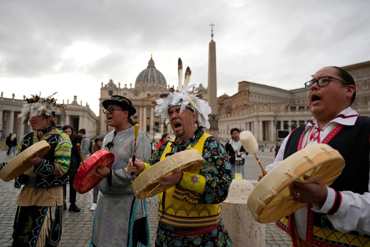 Members of the Assembly of First Nations perform in St. Peter