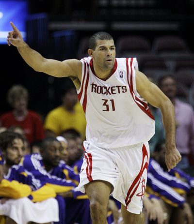 The Rockets’ Shane Battier hit five 3-pointers in Sunday’s victory. (Associated Press / The Spokesman-Review)