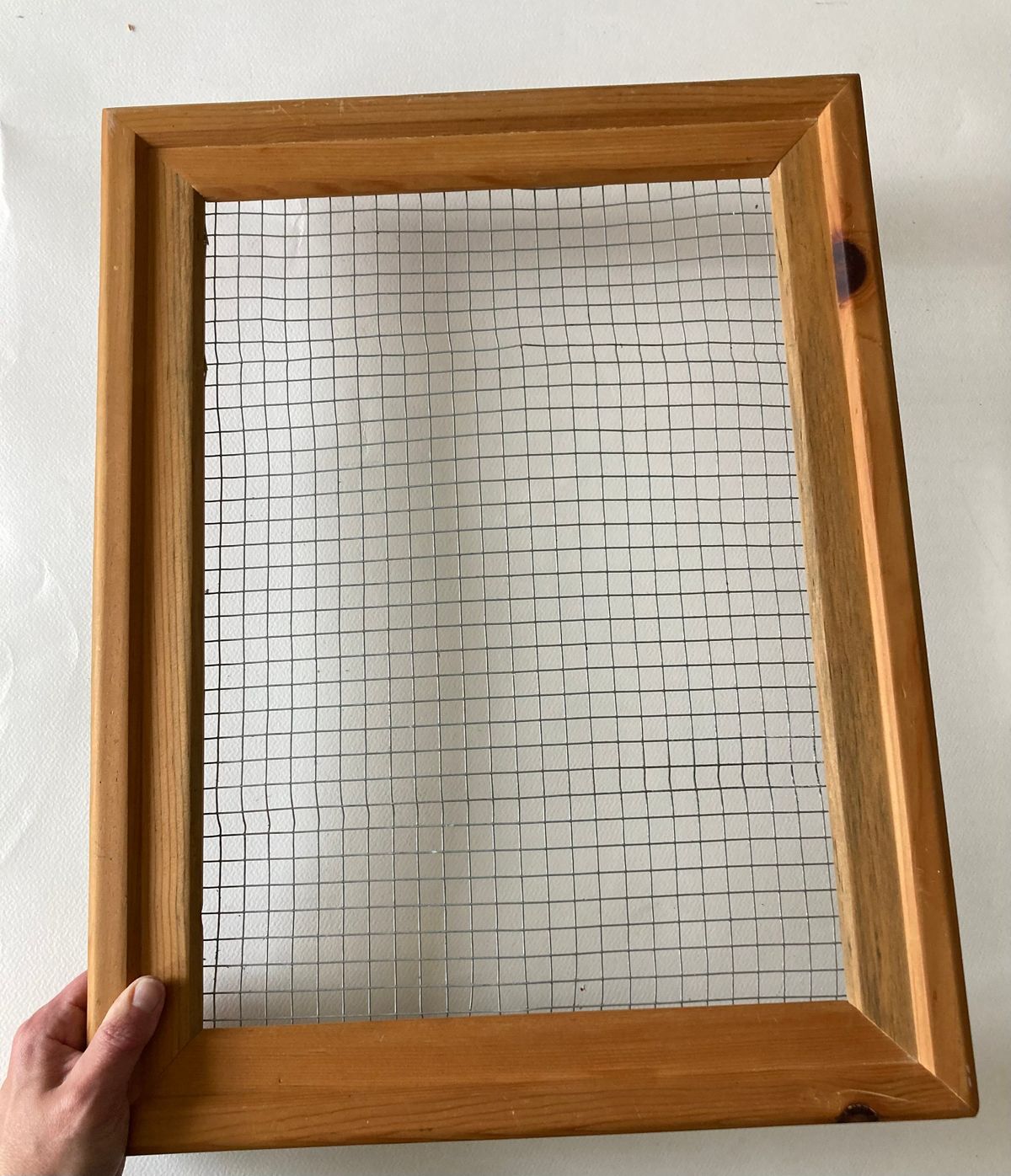 Cut a piece of hardwire cloth to fit in the frame and use a staple gun to attach it.  (Katie Patterson Larson/For The Spokesman-Review)
