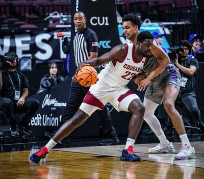 Washington State forward ND Okafor backs down a Portland defender during a West Coast Conference Tournament game on Friday in Las Vegas.  (Courtesy of WSU Athletics)