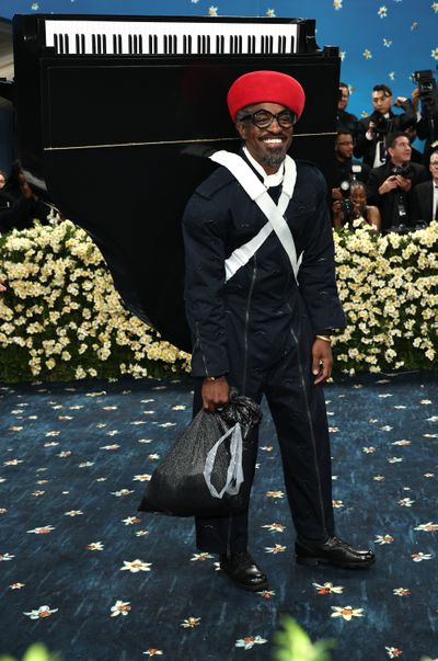André 3000 attends the 2025 Met Gala Celebrating “Superfine: Tailoring Black Style” at Metropolitan Museum of Art on Monday in New York.  (Getty Images)