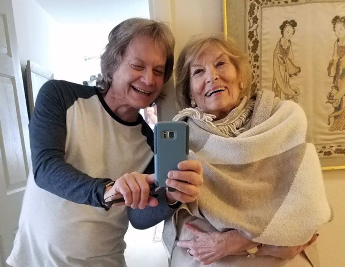 Leland Stein, left, takes a photo with his mother Sondra Green in her apartment in New York on April 26, 2018. The two are reuniting in person for Mother’s Day as vaccinations have made families feel more comfortable gathering for the holiday.  (Leland Stein)