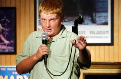 
Comedy club emcee Sean Smith tells a joke during family night in a coffeehouse in Sea Isle City, N.J., on Aug. 25.
 (Associated Press / The Spokesman-Review)