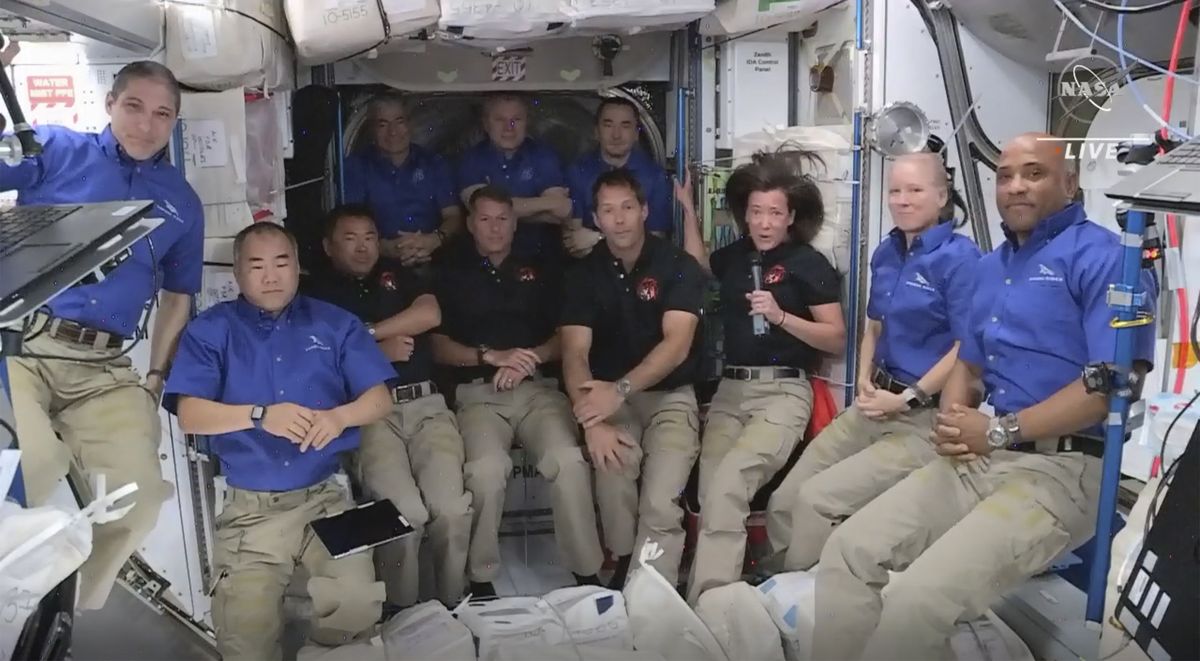 This image provided by NASA, astronauts from SpaceX join the astronauts of the International Space Station for an interview on Saturday, April 24, 2021. A recycled SpaceX capsule carrying four astronauts has arrived at the International Space Station, a day after launching from Florida. The Dragon capsule docked autonomously with the orbiting outpost on Saturday.  (HOGP)
