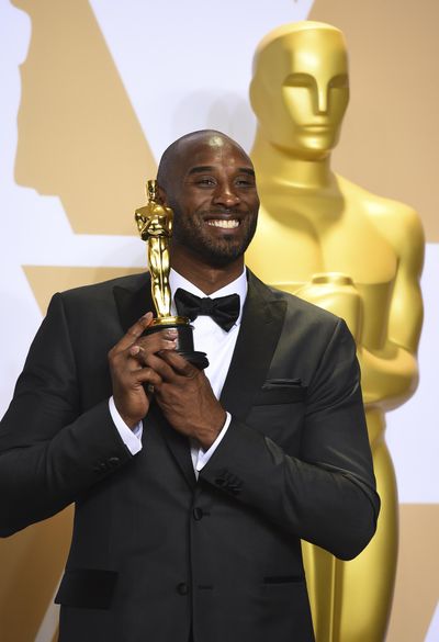 Kobe Bryant, winner of the award for best animated short for “Dear Basketball,” poses in the press room at the Oscars on Sunday night at the Dolby Theatre in Los Angeles. (Jordan Strauss / Jordan Strauss/Invision/AP)