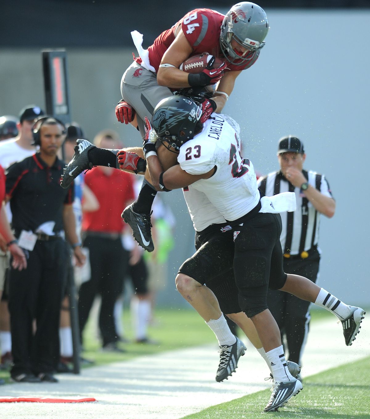 Washington State receiver River Cracraft is forced out of bounds by the Southern Utah defense during the first half on Saturday. (Tyler Tjomsland)