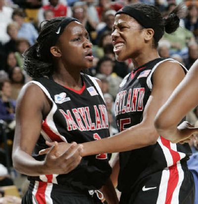 
Maryland's Crystal Langhorne, left, celebrates with teammate Laura Harper in the semifinal win over North Carolina. 
 (Associated Press / The Spokesman-Review)