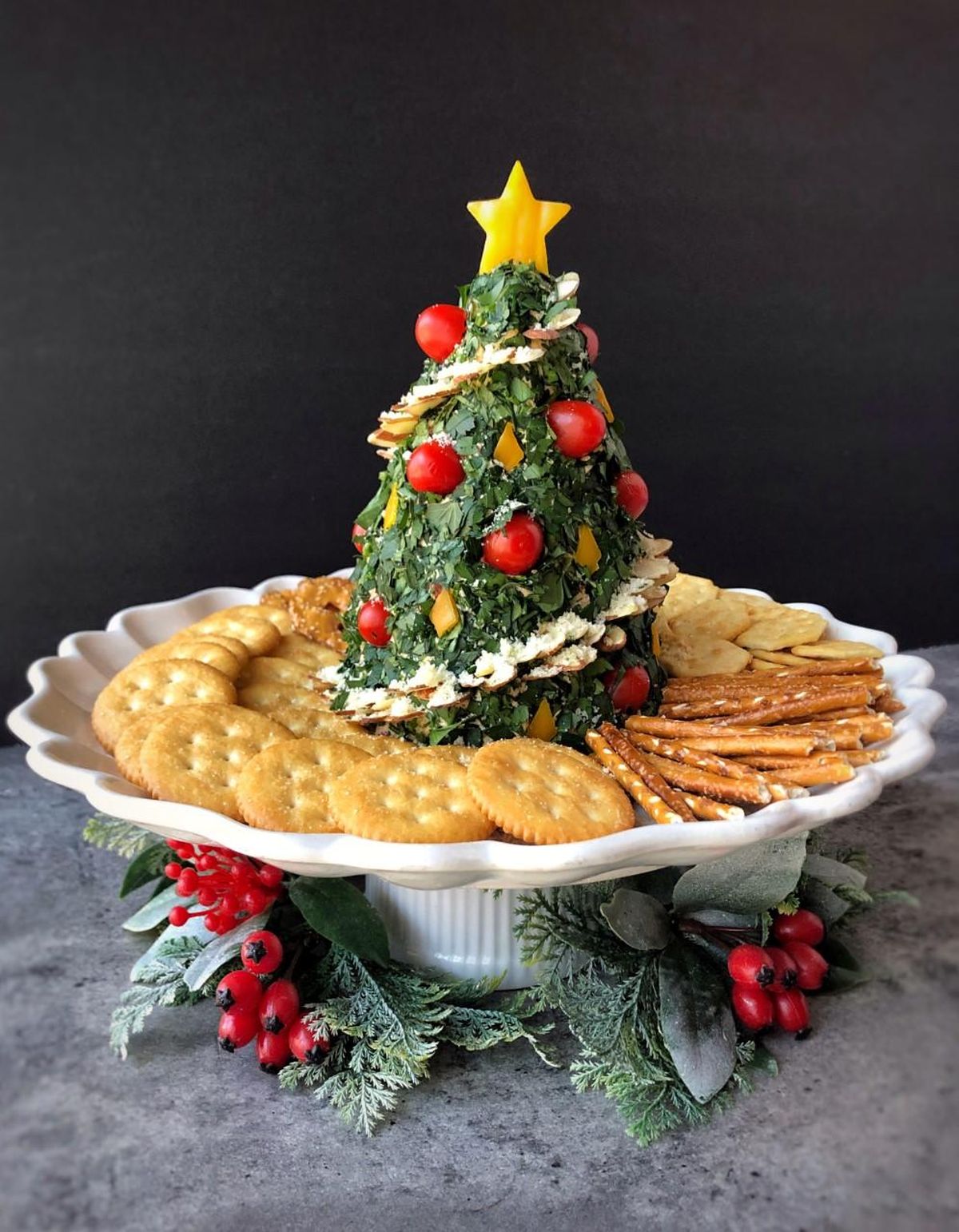 A Christmas tree cheese ball is a festive addition to any holiday occasion. (Audrey Alfaro / For The Spokesman-Review)