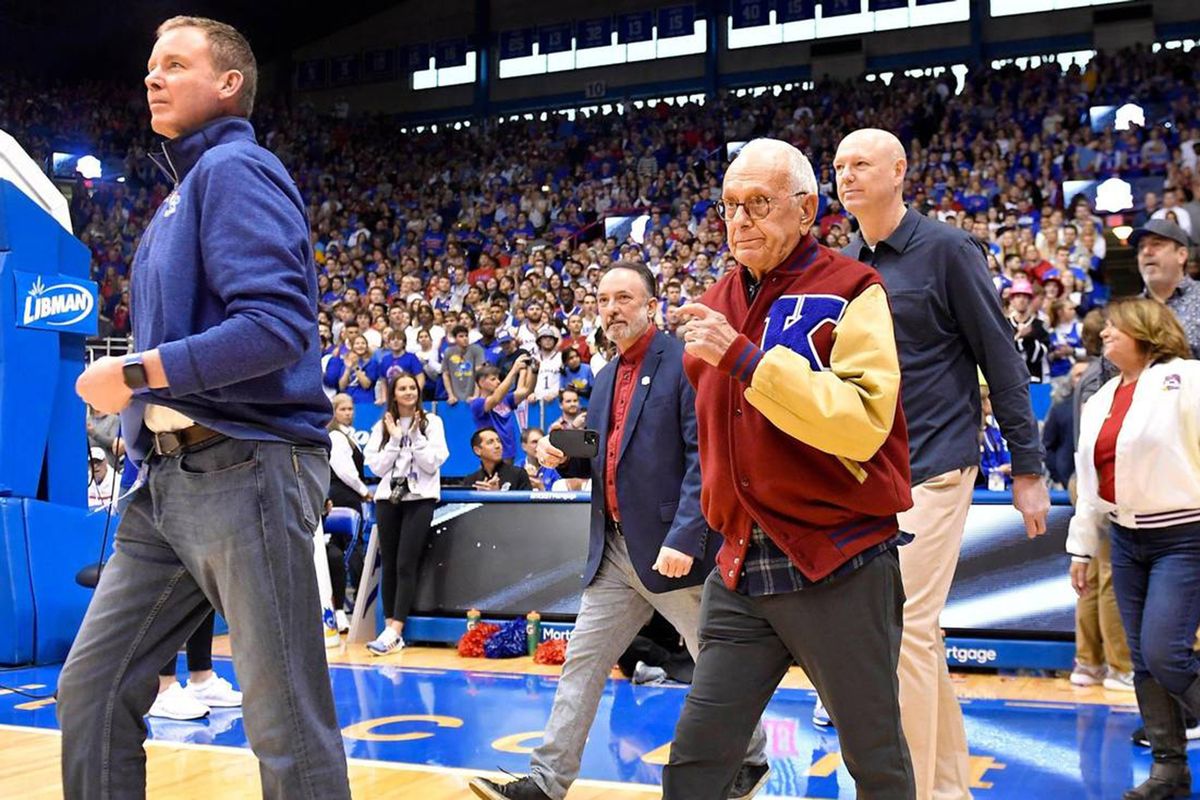 Former Kansas coach Larry Brown walks onto the Allen Fieldhouse floor during halftime ceremonies on Jan. 14 in Lawrence, Kansas.  (Kansas City Star)