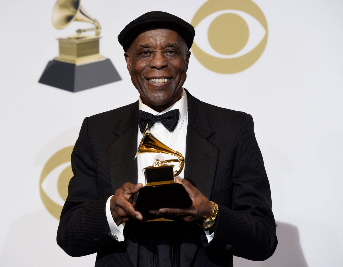 Buddy Guy stands in the media room with the award for best traditional blues album for "The Blues Is Alive and Well " at the 61st Grammy Awards at Staples Center on Feb. 10, 2019, in Los Angeles.  (Chris Pizzello/Invision/AP)
