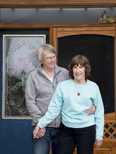 Herb and Ruth Beck pose for a photo on their front porch on Jan. 14 in Spokane. (Tyler Tjomsland / The Spokesman-Review)