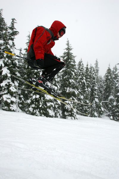 Under overcast skies, Greg Smith, 14, of Corvallis Oregon floats over a powder jump, while skiing at Hoodoo Ski Area, in Oregon Tuesday, Dec. 27, 2005. (ANDY TULLIS / Associated Press)