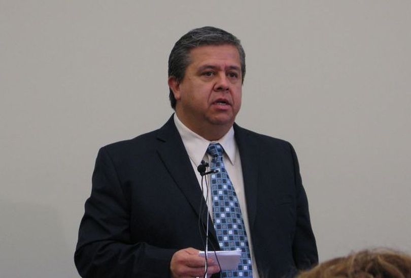 Idaho state schools Supt. Tom Luna addresses the Idaho Press Club on Wednesday; he said he thought student opposition to his school reform plan was due to 