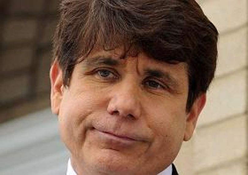 Gov. Blagojevich at 4:51 p.m. today became the first governor in Illinois’ 190-year history to be driven from office by impeachment. Photo Credit: Chicago Sun-Times (The Spokesman-Review)