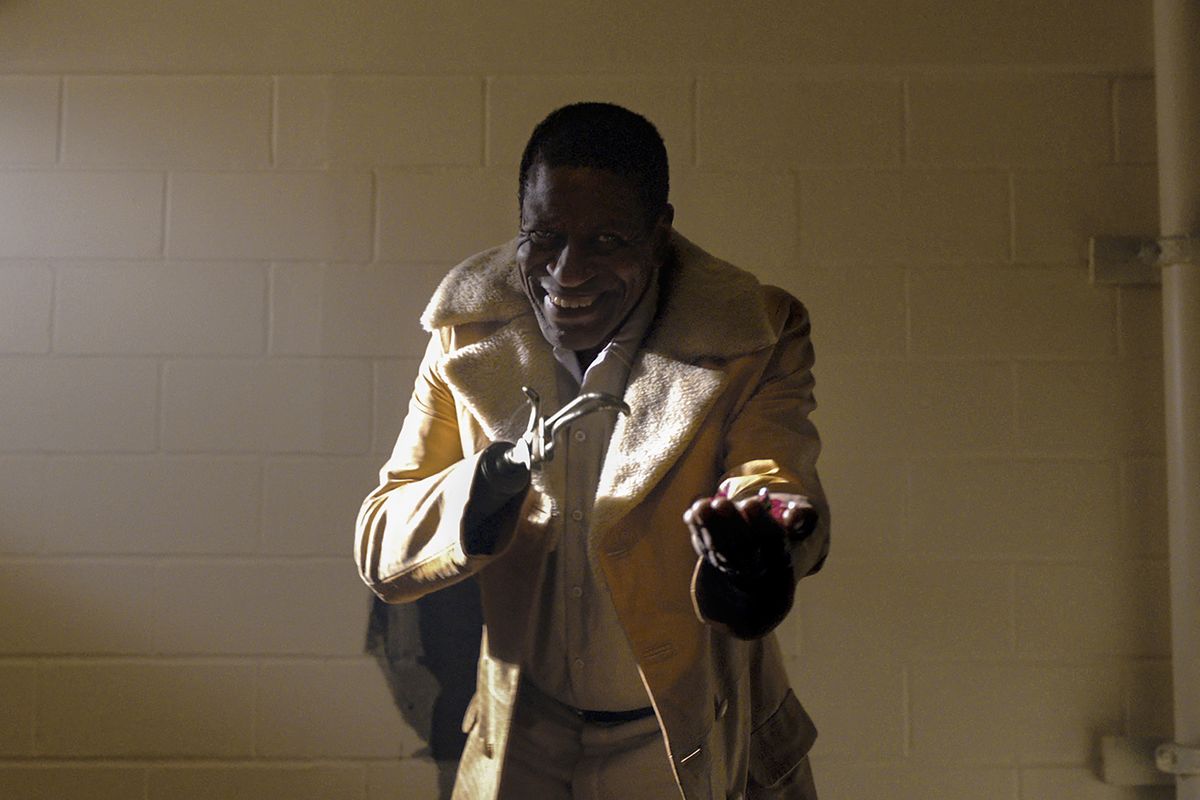 This image released by Universal Pictures shows Michael Hargrove as Sherman Fields in a scene from "Candyman," directed by Nia DaCosta.  (HONS)