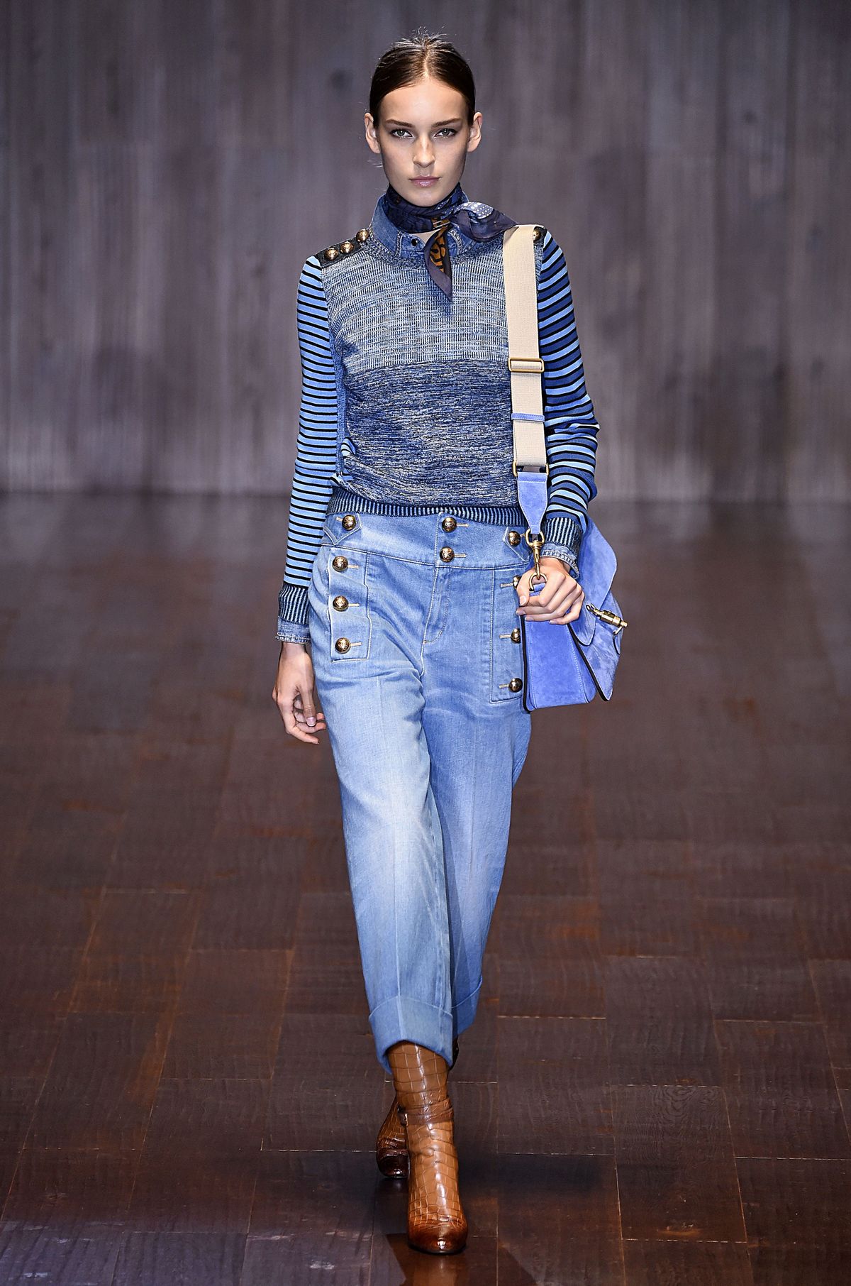 Cropped denim military trousers from Gucci are some of the many denim items high-fashion designers are sending down the runway.