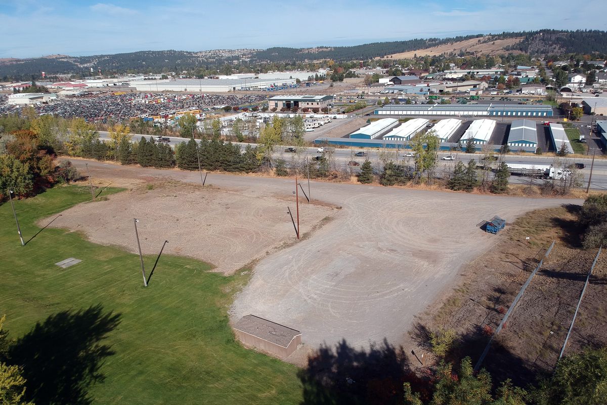 The sandy area that was used for many years as an equestrian arena, next to I-90 and below Valley Mission Park, will be developed as a new park, shown Friday, Oct. 9, 2020 in Spokane Valley, Washington.  (Jesse Tinsley/The Spokesman-Review)