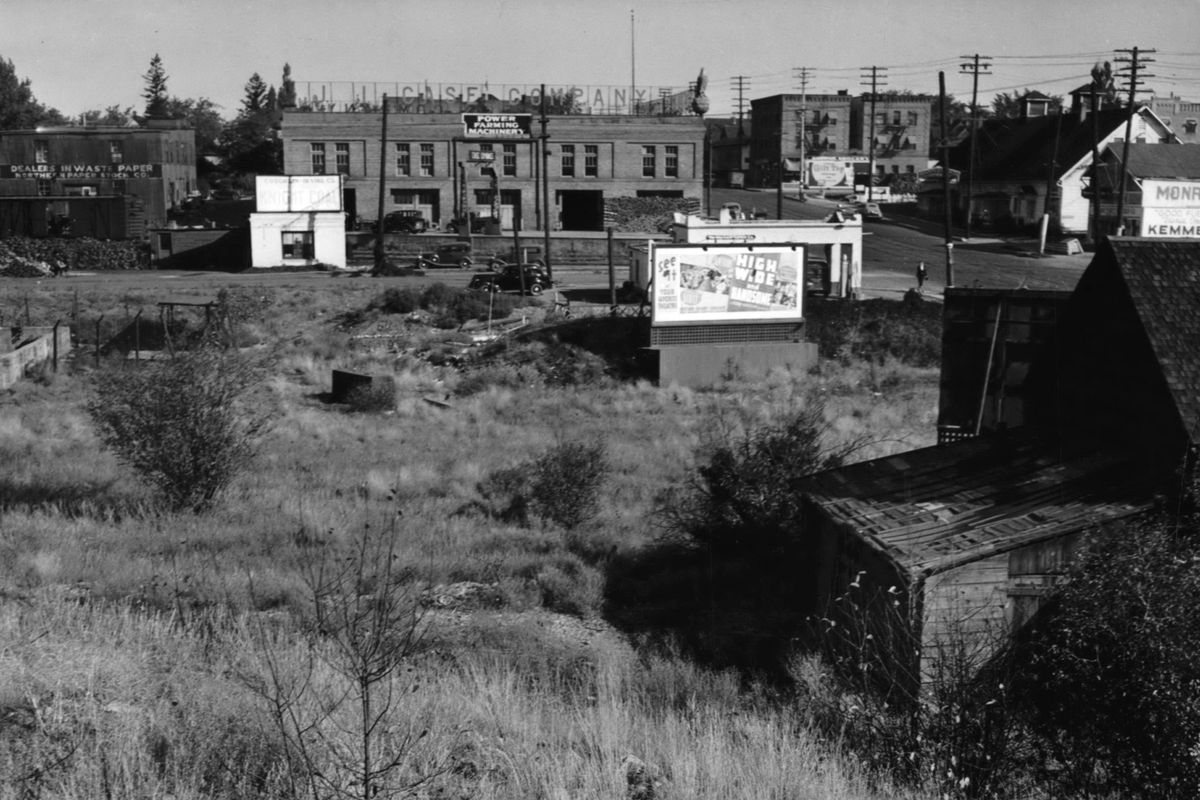 The J.I. Case Company dealership, seen here at the top of this 1941 photo, was built in 1909, and the business stayed in the building until 1967. The two-story building housed Import Market from 1967 until 1986, then became a Recreational Equipment Inc. store, which it remains today. REI, founded in Seattle in 1938, is a leader in outdoor recreational gear. (The Spokesman-Review Photo Archive / SR)