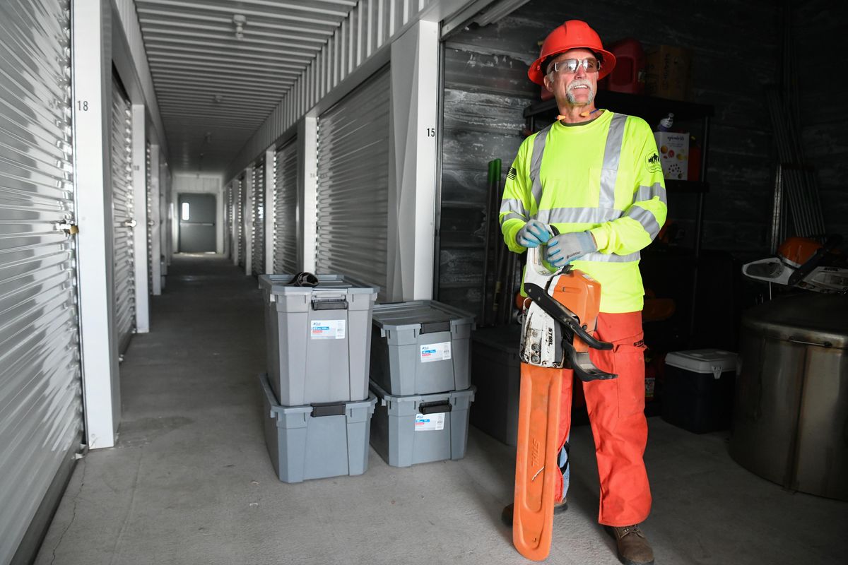 Andy Hail, of the group Veterans Community Response,  is leading  a four-person group of veterans  volunteering their services as chain saw operators in recovery efforts in North Carolina. The group has a cache of saws and other equipment. Hail is photographed at the group’s storage unit in Spokane Valley on Wednesday, Sept. 19, 2018. (Jesse Tinsley / The Spokesman-Review)