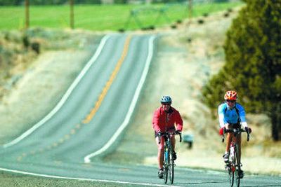 
Bicyclists are blooming on the region's roadways. Many are training for organized high-mileage group tours.
 (Associated Press / The Spokesman-Review)