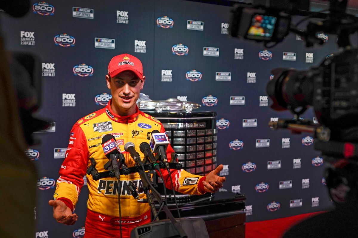 Joey Logano talks to reporters during NASCAR Daytona 500 auto racing media day at Daytona International Speedway, Wednesday, Feb. 16, 2022, in Daytona Beach, Fla.  (John Raoux)