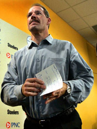 
Pittsburgh Steelers coach Bill Cowher leaves his weekly press conference.
 (Associated Press / The Spokesman-Review)