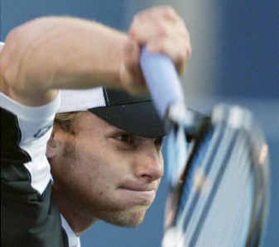 
American Andy Roddick blasts a serve at Nicolas Kiefer during their semifinal match on Saturday in Toronto. 
 (Associated Press / The Spokesman-Review)