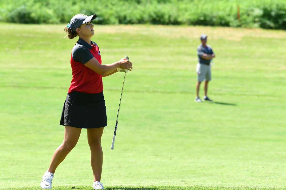 Kaysa Panke of Davenport High School watches her approach shot at Hangman Valley Golf Course on Wednesday during the State 1B/2B/1A golf tournament. (Jesse Tinsley / The Spokesman-Review)