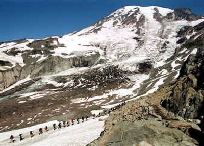 
Big groups stay on main Mount Rainier routes; Liberty Ridge is more intimate and dangerous.
 (File/Associated Press / The Spokesman-Review)