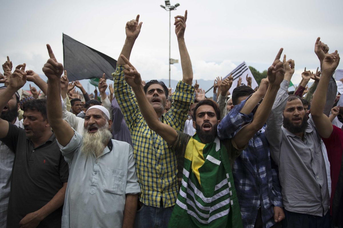 Kashmiri Muslims shout pro-freedom slogans during a demonstration after Friday prayers amid curfew like restrictions in Srinagar, India, Friday, Aug. 16, 2019. Hundreds of people have held a street protest in Indian-controlled Kashmir as India’s government assured the Supreme Court that the situation in the disputed region is being reviewed daily and unprecedented security restrictions will be removed over the next few days. (Dar Yasin / Associated Press)