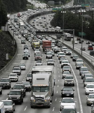 Northbound traffic on Interstate Highway 5 moves slowly toward downtown Seattle Wednesday, Aug. 8, 2007. (AP Photo/Ted S. Warren)