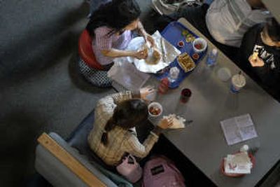 
The Spokesman-ReviewEWU students and staff have lunch in the Student Union building last week. Rising food costs have put a pinch on the food service industry at area colleges
 (Christopher Anderson/ / The Spokesman-Review)