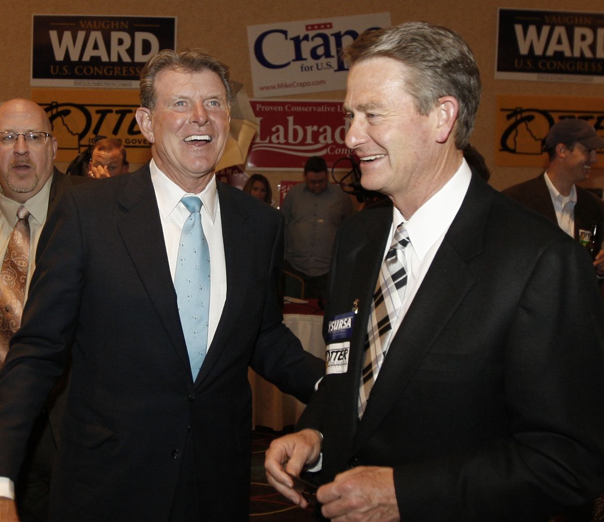 Idaho Gov. Butch Otter talks with Lt. Gov. Brad Little on Tuesday at the Republican campaign headquarters in Boise. Otter defeated five challengers to win his party’s nomination.Associated Press photos (Associated Press photos)