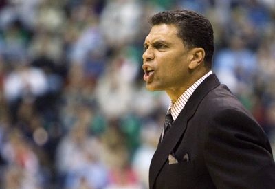 Reggie Theus became the sixth NBA coach fired this season.  (Associated Press / The Spokesman-Review)