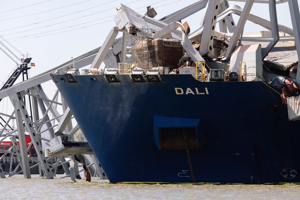 The bow of the Dali cargo ship and the collapsed Key Bridge. MUST CREDIT: Wesley Lapointe for The Washington Post  (Wesley Lapointe/The Washington Post)