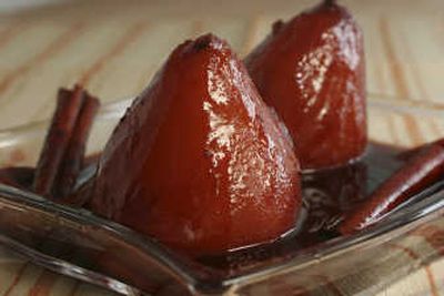 
Pears Poached in Red Wine use cardamom, vanilla and cinnamon in a robust red wine that creates an intensely aromatic syrup.
 (The Spokesman-Review)