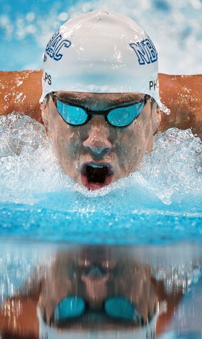 Michael Phelps will try to add to his 14 Olympic gold medals. (Associated Press)