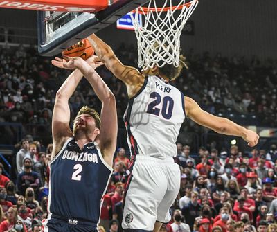 Gonzaga forward Kaden Perry meets Drew Timme at the rim for a blocked shot during Kraziness in the Kennel on Saturday. (Dan Pelle / The Spokesman-Review)