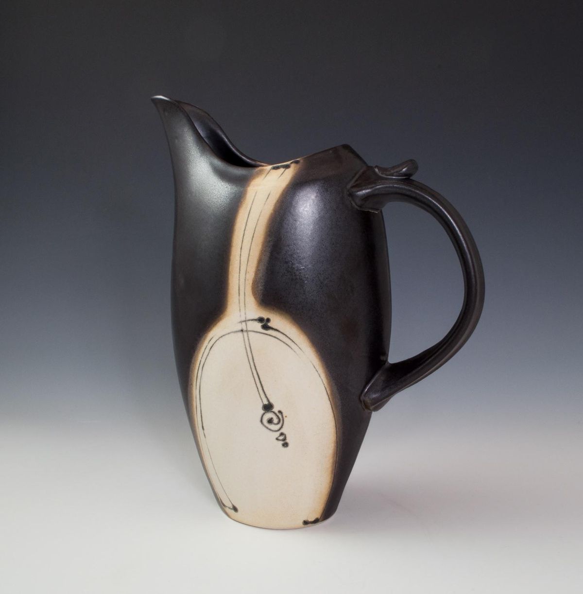 Loren Lukens of Seattle will exhibit his ceramic works created using his signature “squirt bottle” glazing technique at the Trackside Gallery in Spokane.