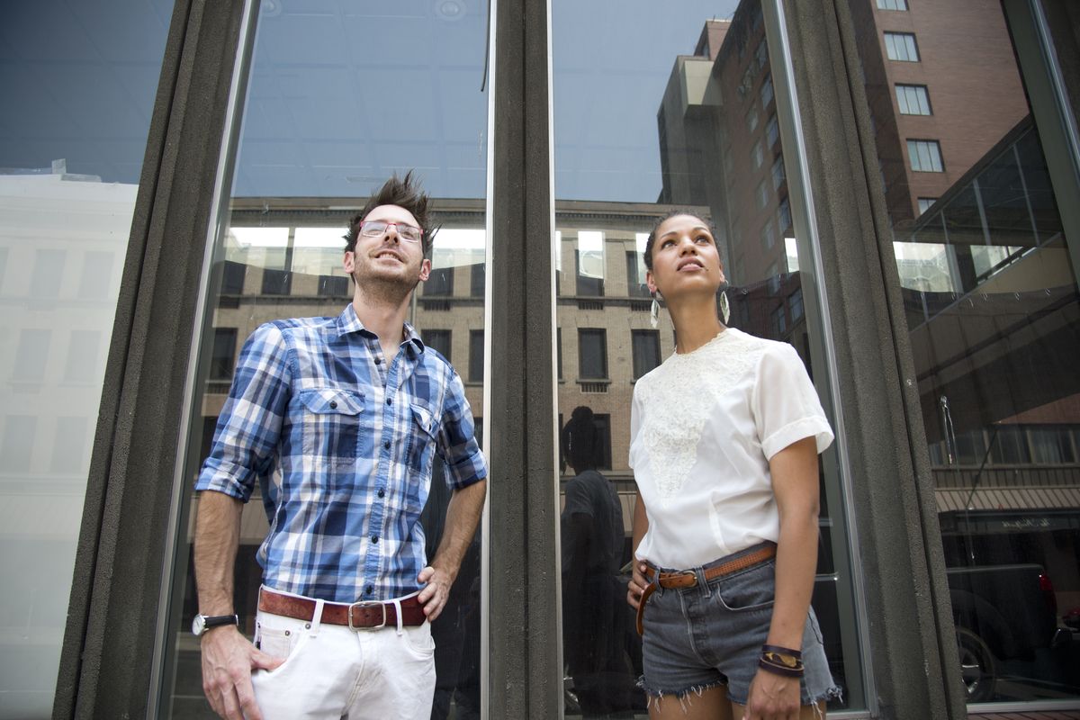 Alan Chatham and Ginger Ewing run Window Dressing, an organization that aims to bring art installations to empty windows and storefronts downtown. They are standing in front of the Ridpath Motor Inn, one of the empty buildings they hope to fill with life. (Jesse Tinsley)