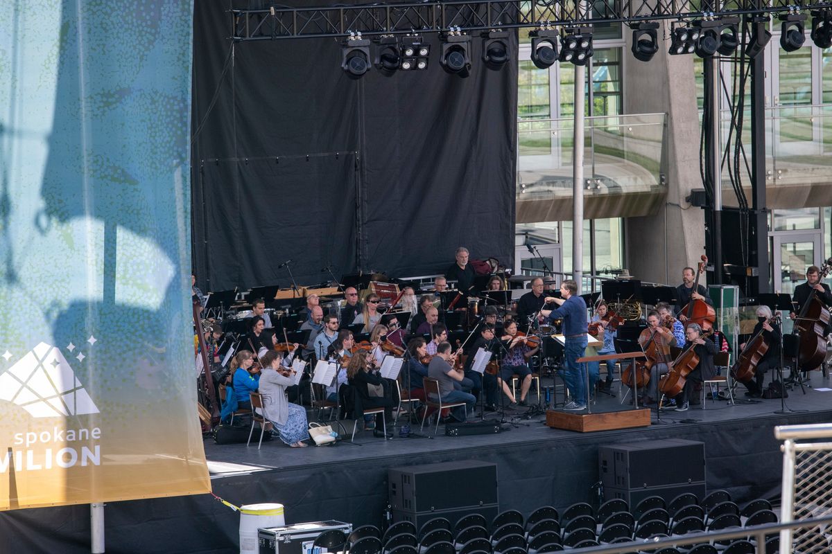 The Spokane Symphony directed by James Lowe rehearses for the Fourth of July free program Monday inside the Pavilion in Riverfront Park.  (Jesse Tinsley/THE SPOKESMAN-REVIEW)