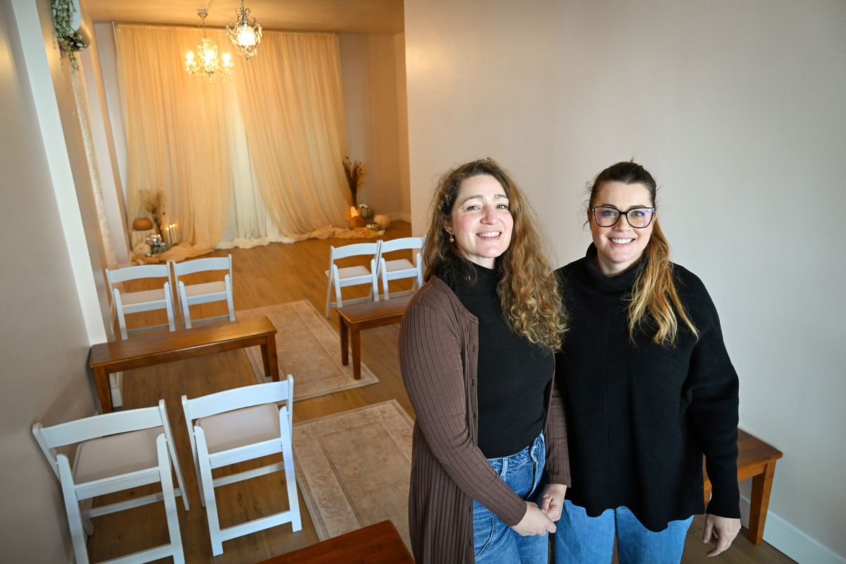 Jade Leonetti, left, and Jonna Kelley have just opened The Vow Room, a small venue for wedding vows and other events at 233 W. Riverside Ave. in downtown Spokane, shown Tuesday. The interior of their meeting space can be reconfigured for yoga classes, parties and holiday events.  (Jesse Tinsley/THE SPOKESMAN-REVIEW)